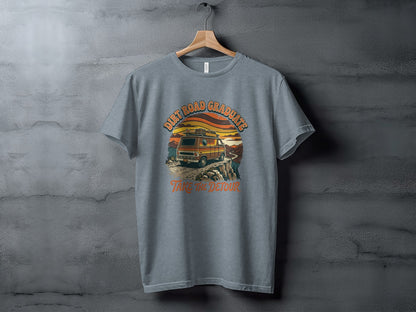Heritage Dirt Road Graduate Adventure Tee Nomad Tee: Gray t-shirt with "Dirt Road Graduates Take The Detour" text and sunset van graphic.