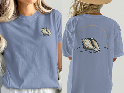 Two views of a light blue t-shirt with a Puka shell graphic and "Puka Luna" text.