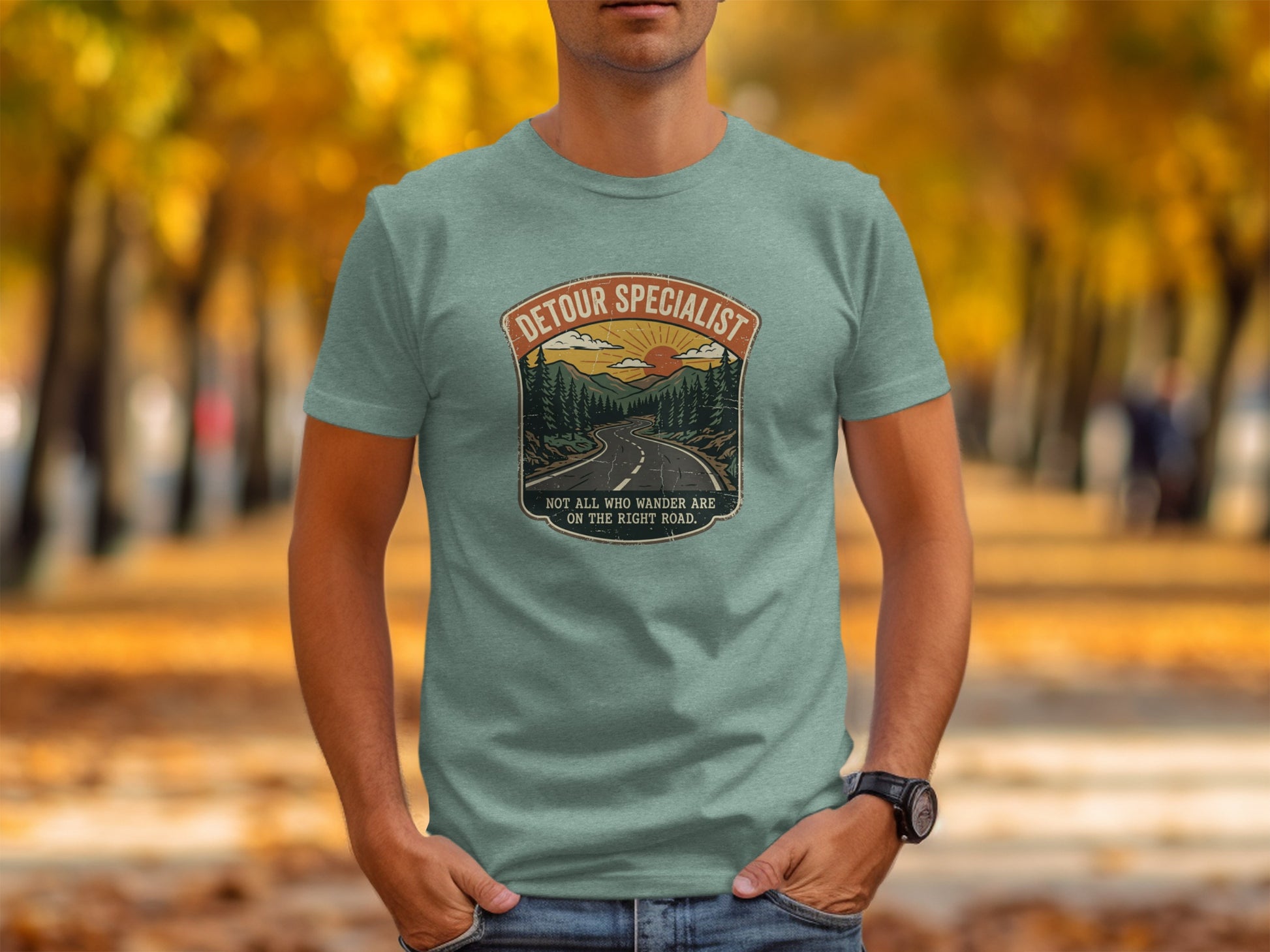 Heritage Detour Specialist Vintage Graphic Nomad Tee: T-shirt with "Detour Specialist" text and a mountain road scene.