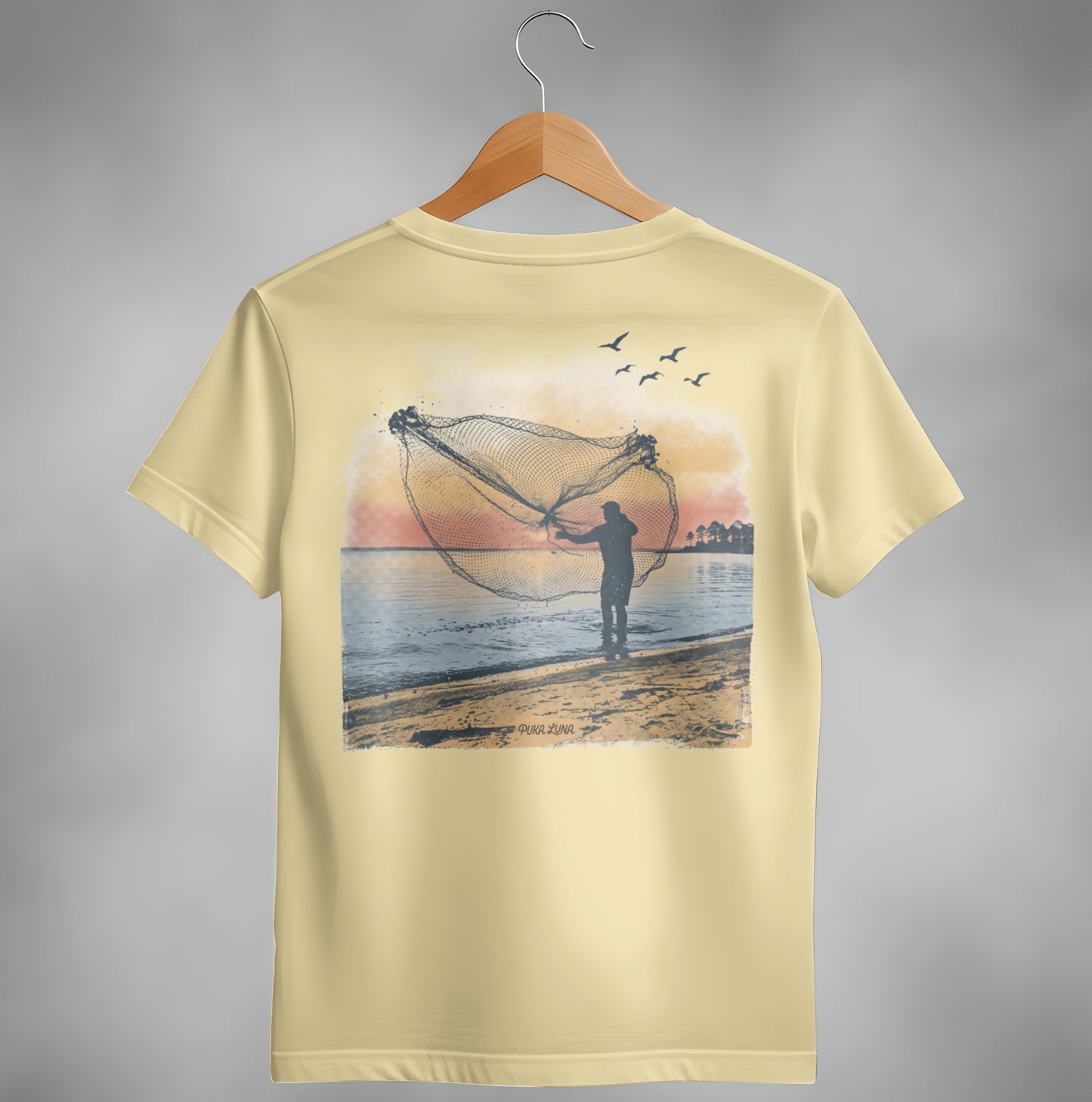 Fisherman casting net at sunset with birds flying over water.