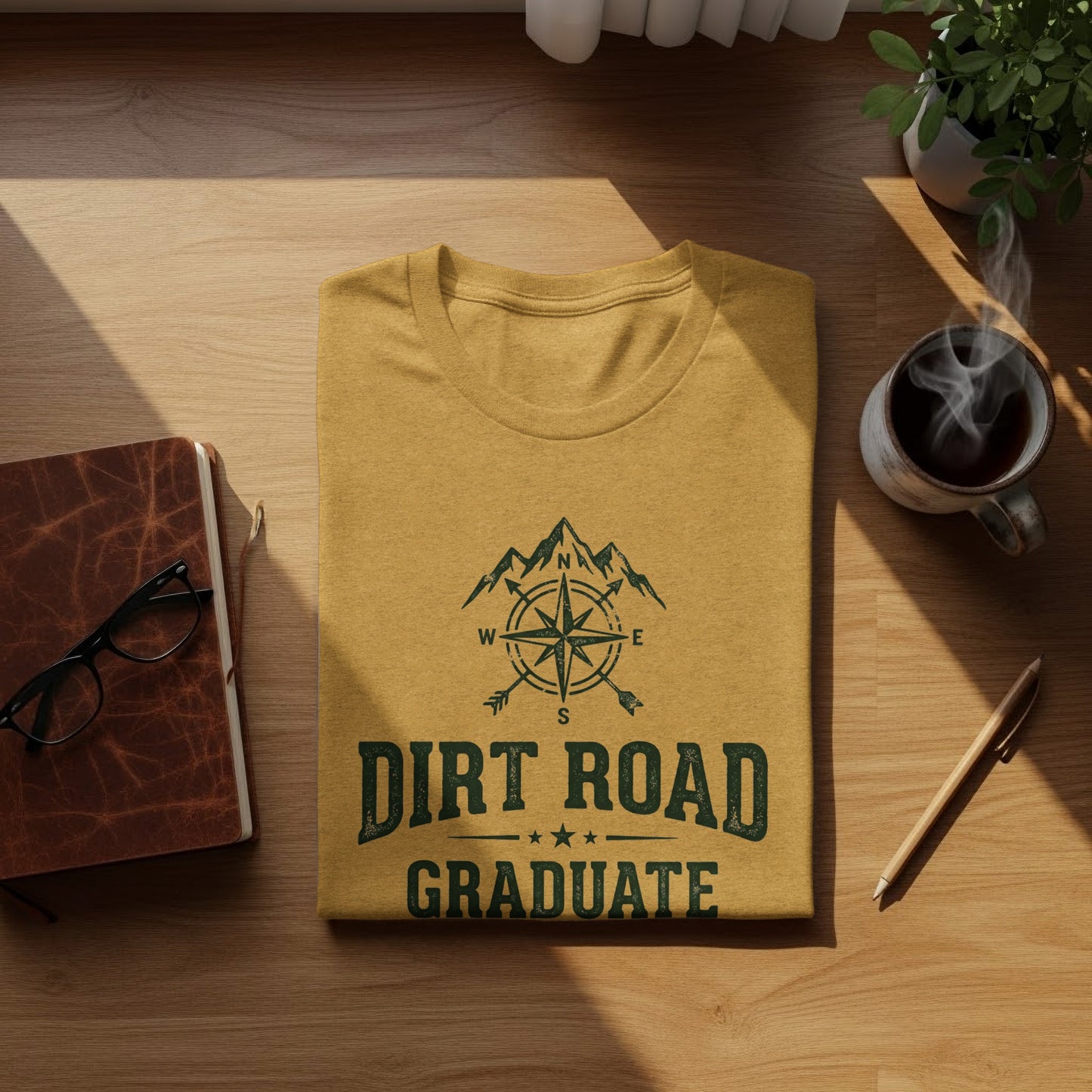 The Original Dirt Road Graduate Outdoor Adventure Top: Yellow t-shirt with "Dirt Road Graduate" and compass design.