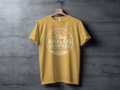 Analog Compass Heritage: The Explorer's Adventure Tee: Yellow t-shirt with "Analog Compass" and compass graphic.