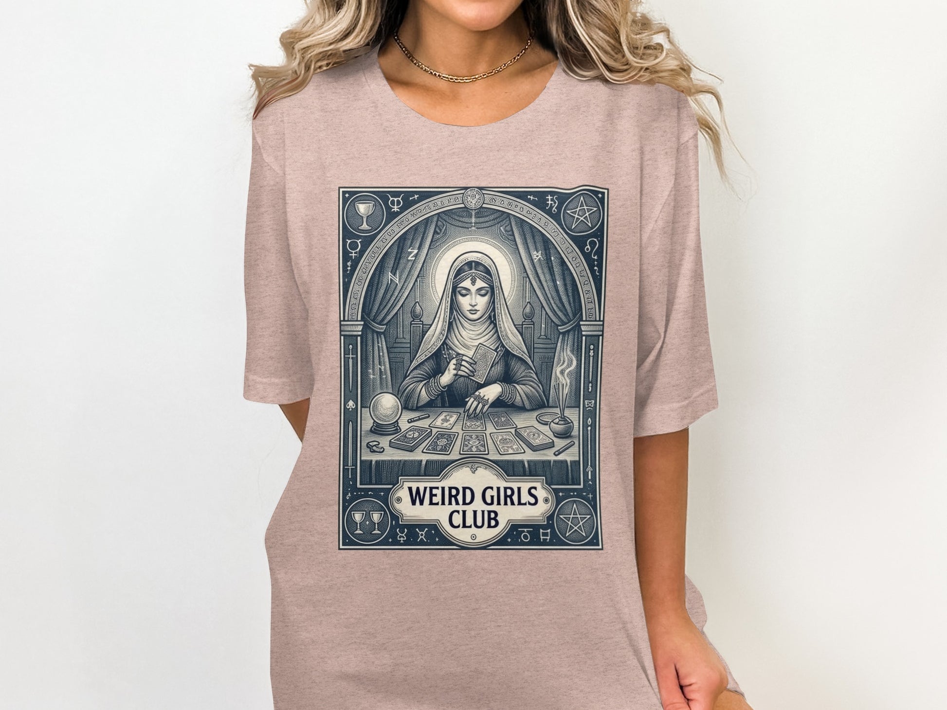 Tarot card reader with "Weird Girls Club" logo.