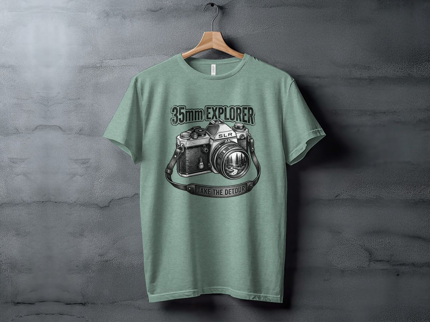 35mm Explorer Detour | Vintage Outdoor Apparel: Green t-shirt with vintage camera graphic and "35mm EXPLORER TAKE THE DETOUR" text.