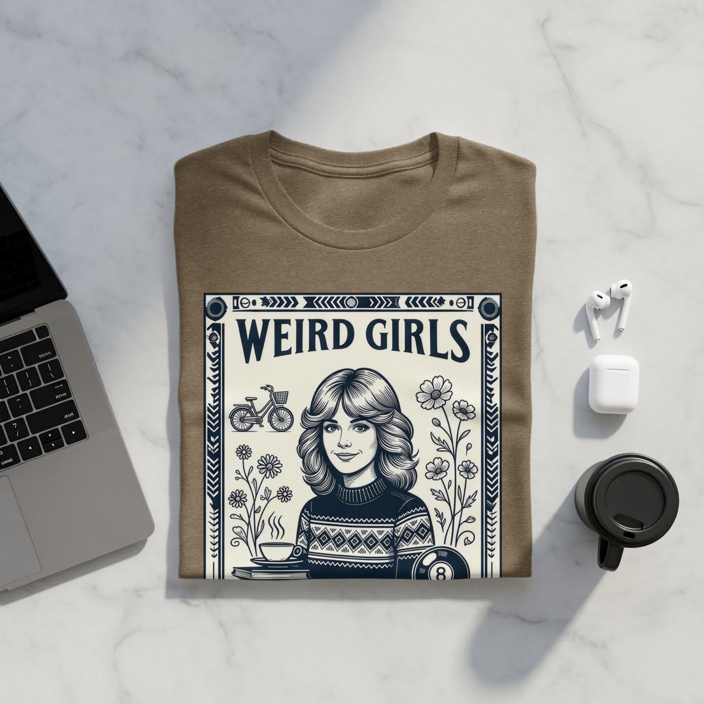 T-shirt with "Weird Girls" text and retro illustration of a woman by a table.