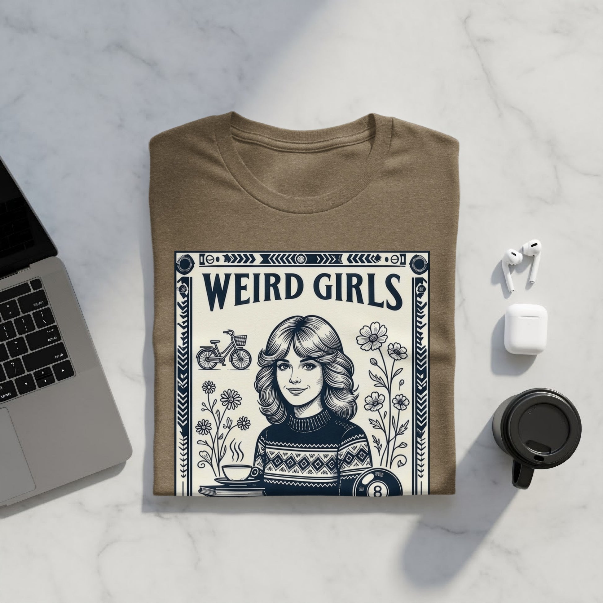 T-shirt with "Weird Girls" text and retro illustration of a woman by a table.