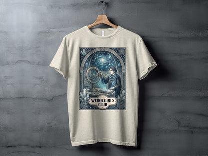 T-shirt with a woman studying a celestial globe and astrological symbols.