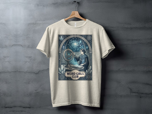 T-shirt with a woman studying a celestial globe and astrological symbols.