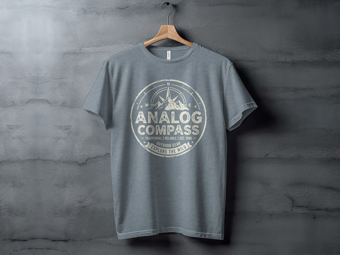 Analog Compass Heritage: The Explorer's Adventure Tee: Gray t-shirt with "Analog Compass" and "Explore the Wild" text.