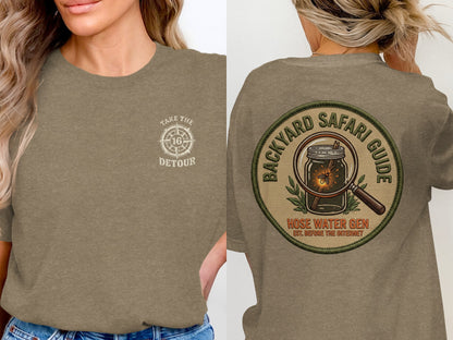 T-shirt with "Take the 16 Detour" on front and "Backyard Safari Guide Hose Water Gen" on back.