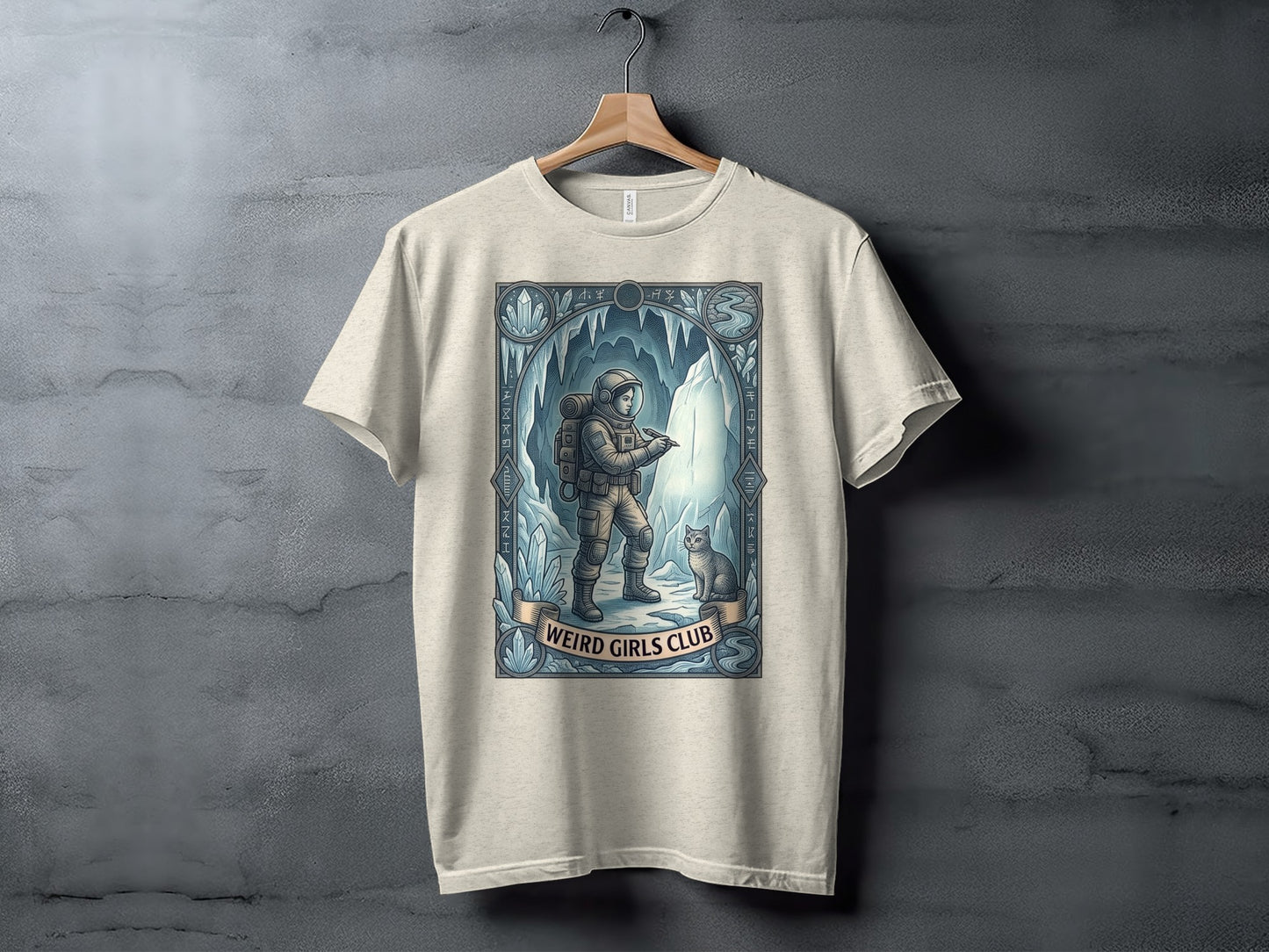 Astronaut and cat in icy cave, "Weird Girls Club" text banner.