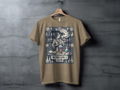 T-shirt featuring a woman in a lab with "Weird Girls Club" text.