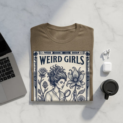 Brown t-shirt with "WEIRD GIRLS" text and illustrative portrait of woman with flowers.