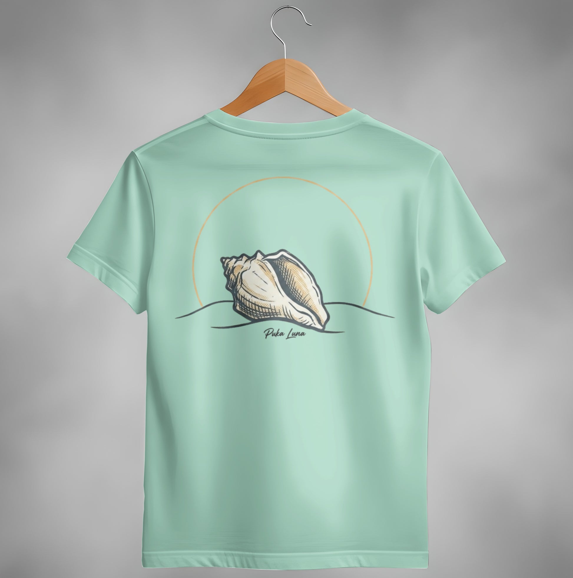 Light blue t-shirt with a conch shell design and "Puka Luna" text.