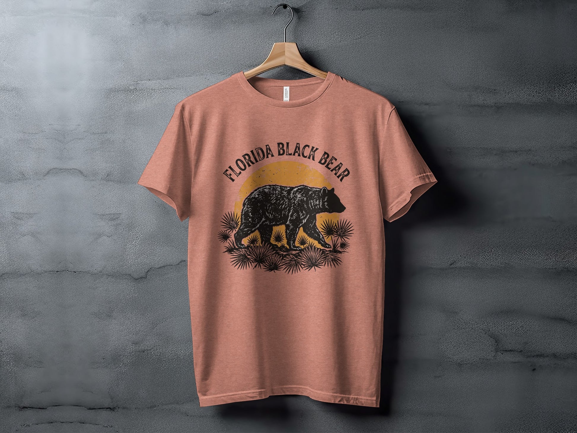 Heritage Florida Bear Trails Classic Nomad Tee: Coral t-shirt with Florida Black Bear graphic and sunset.