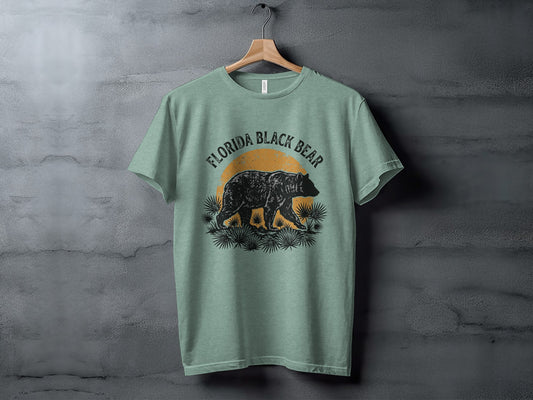 Heritage Florida Bear Trails Classic Nomad Tee: T-shirt graphic: Florida black bear walking through ferns with a setting sun.