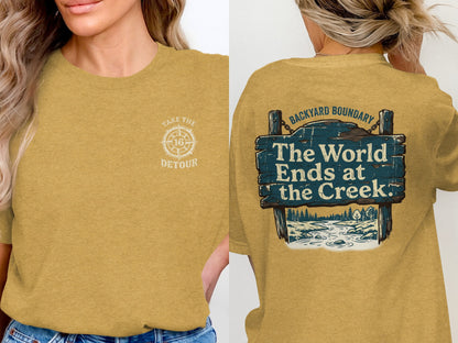 Yellow t-shirt with "Take the Detour" on front and "The World Ends at the Creek" on back.