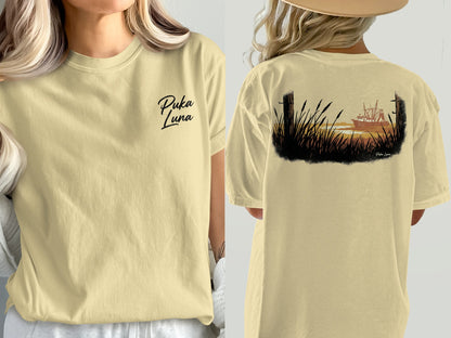 Cream t-shirt with Puka Luna logo on front and sunset boat scene on back.