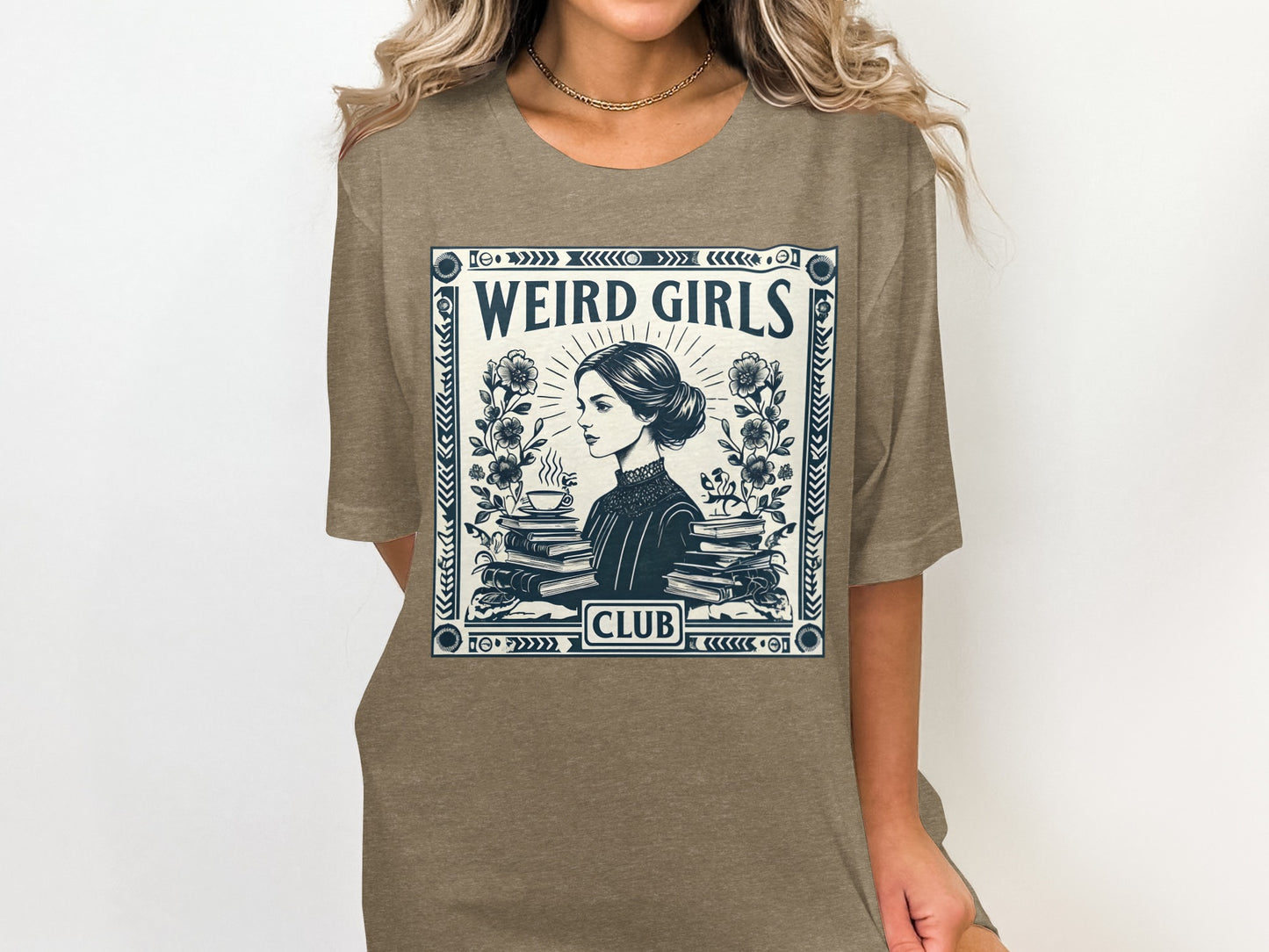 Brown t-shirt with "Weird Girls Club" and illustrated woman reading.