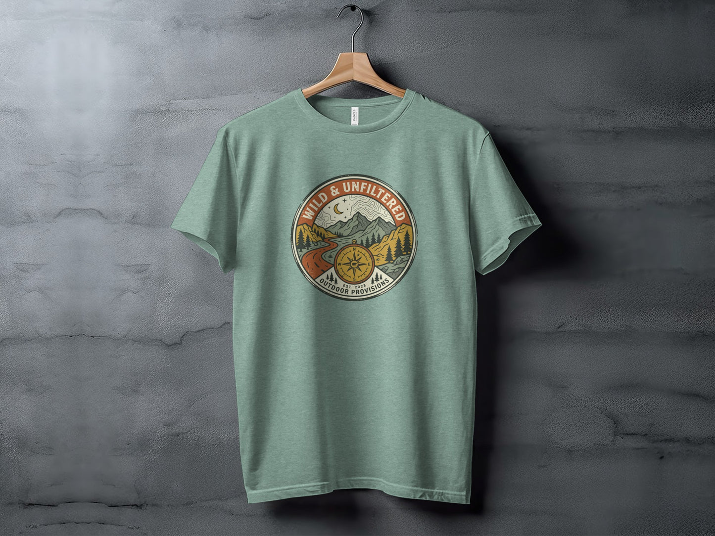 Rugged Wild & Unfiltered Explorer Wilderness Shirt: Green t-shirt with circular "Wild & Unfiltered Outdoor Provisions" graphic.