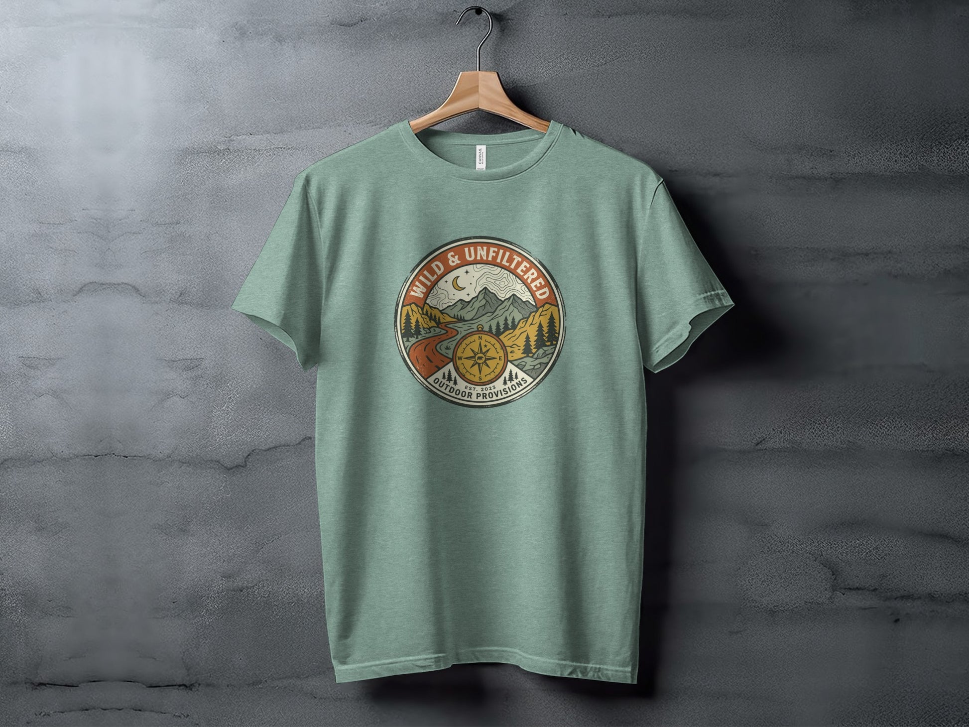 Rugged Wild & Unfiltered Explorer Wilderness Shirt: Green t-shirt with circular "Wild & Unfiltered Outdoor Provisions" graphic.