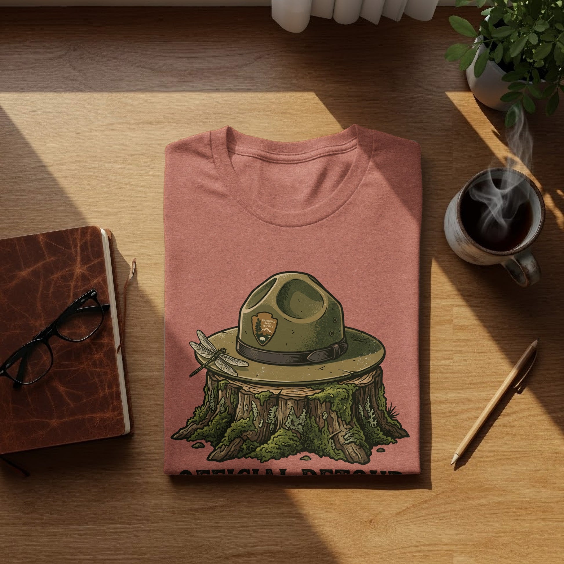 Official Detour Specialist Heritage | Vintage Outdoor Apparel: T-shirt with official park ranger hat on tree stump, dragonfly, and text.