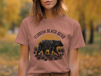 Heritage Florida Bear Trails Classic Nomad Tee: Black bear walking in front of a sun and palm fronds on a t-shirt.
