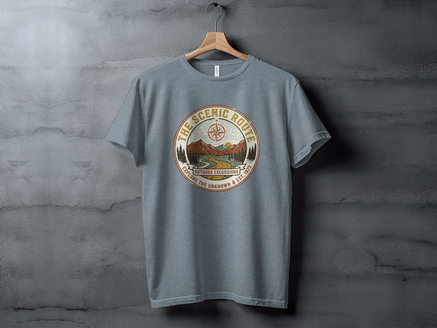 Heritage Scenic Route Vintage Explorer Tee Nomad Tee: Grey t-shirt with "The Scenic Route" circular graphic featuring mountains and trees.