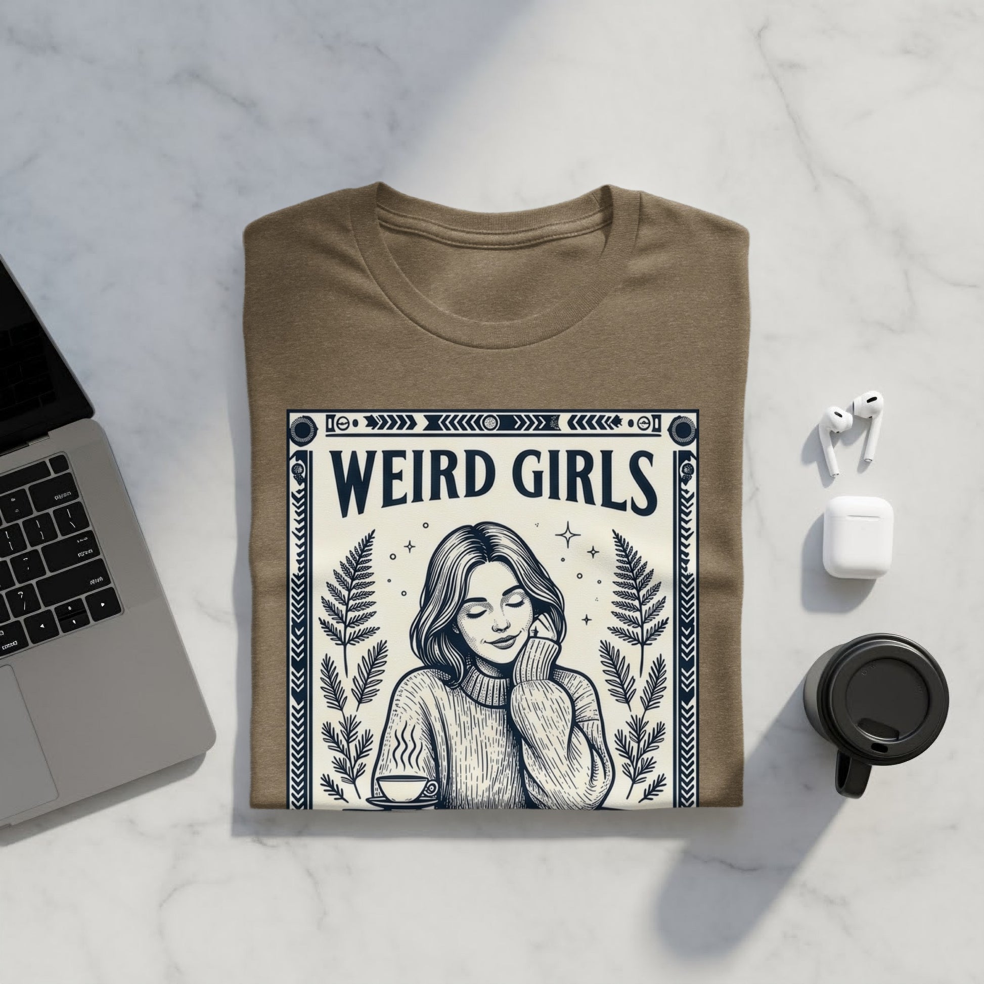 Brown t-shirt with "WEIRD GIRLS" text and woman illustration.