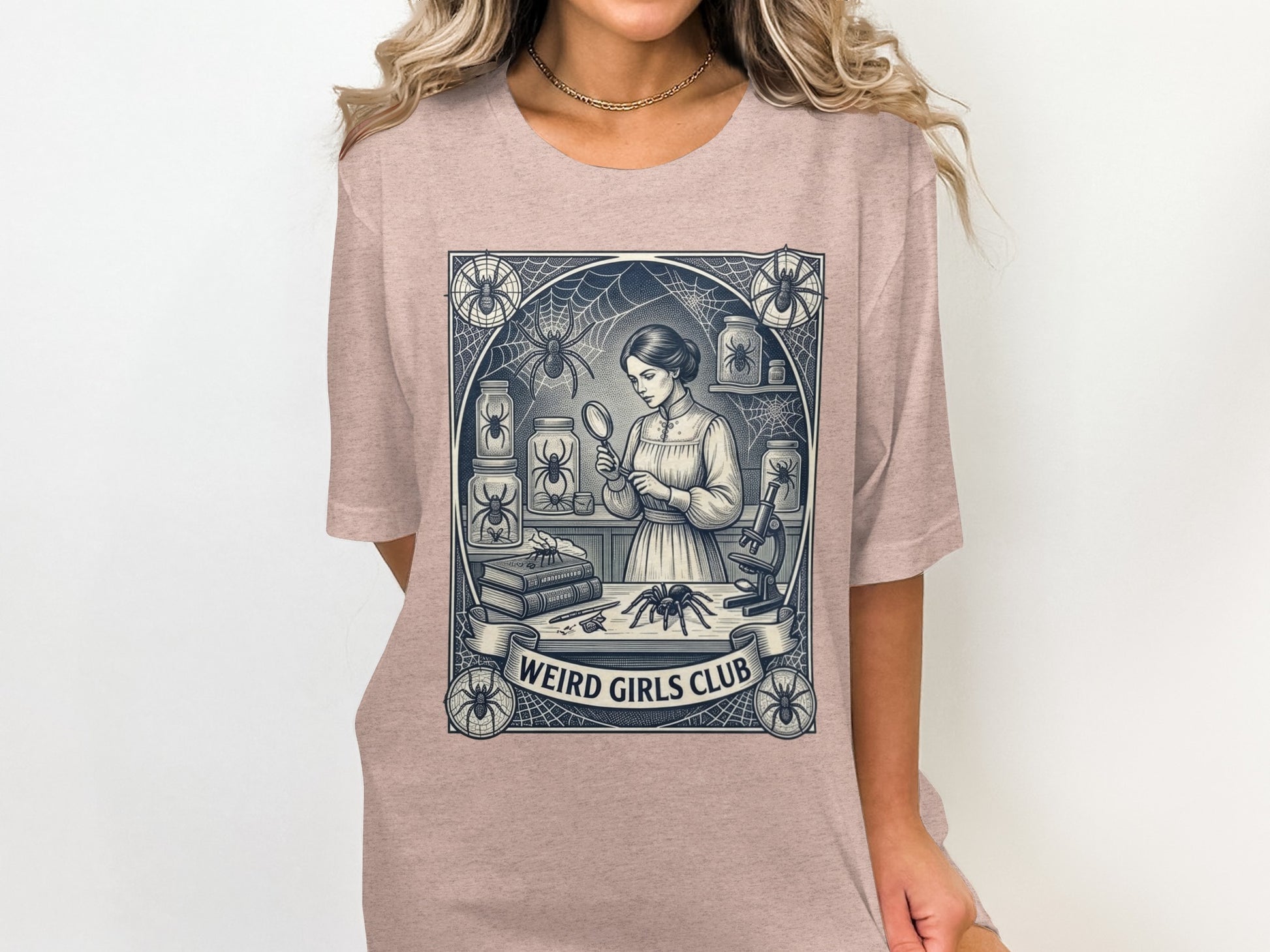 Illustration of a woman examining a spider with a magnifying glass, "Weird Girls Club" banner.