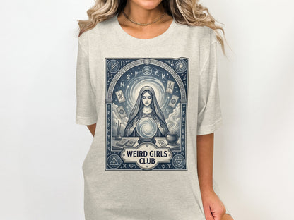 T-shirt featuring a mystic woman reading a crystal ball with astrology symbols.