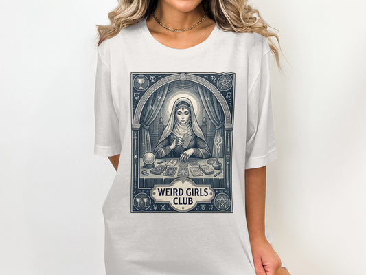 T-shirt featuring tarot cards, crystals, and "Weird Girls Club" text.