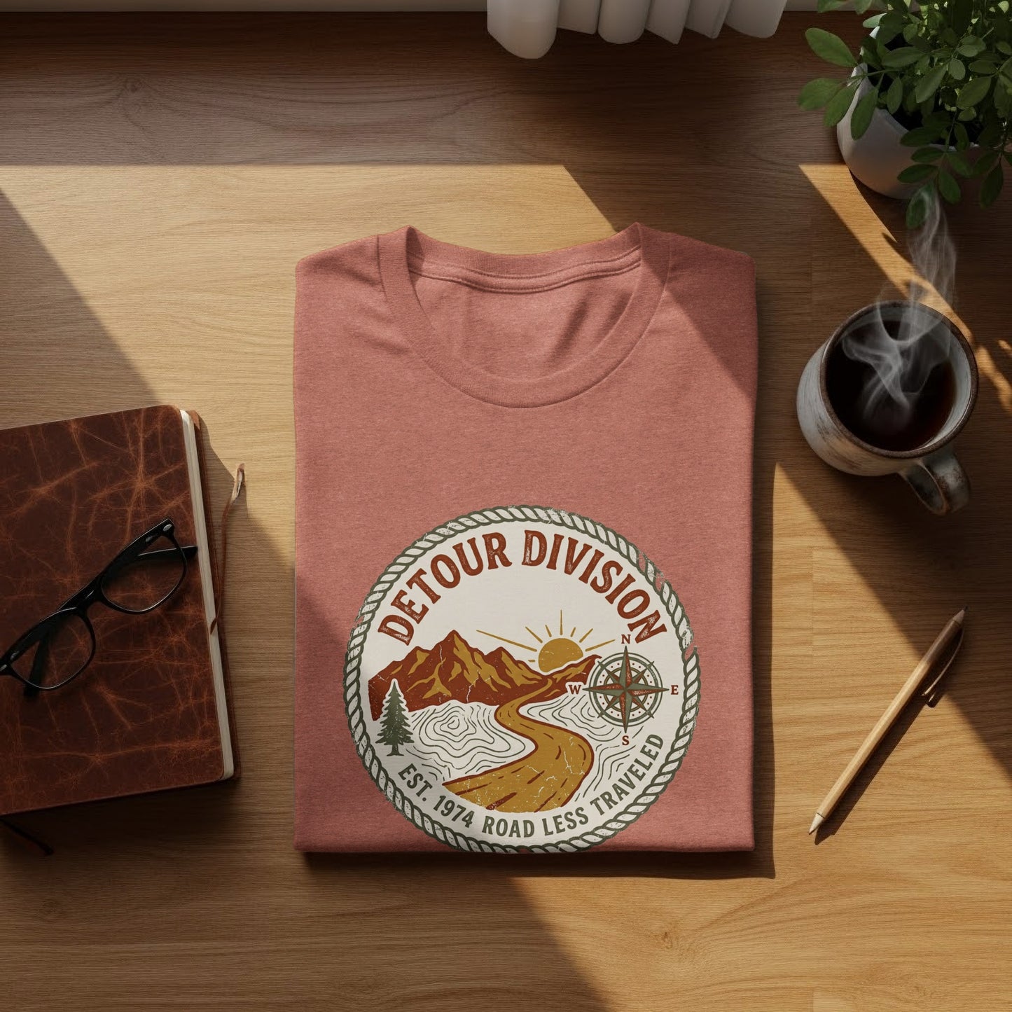 Detour Division Heritage | Vintage Outdoor Apparel: T-shirt with "Detour Division Est. 1974 Road Less Traveled" circular logo.