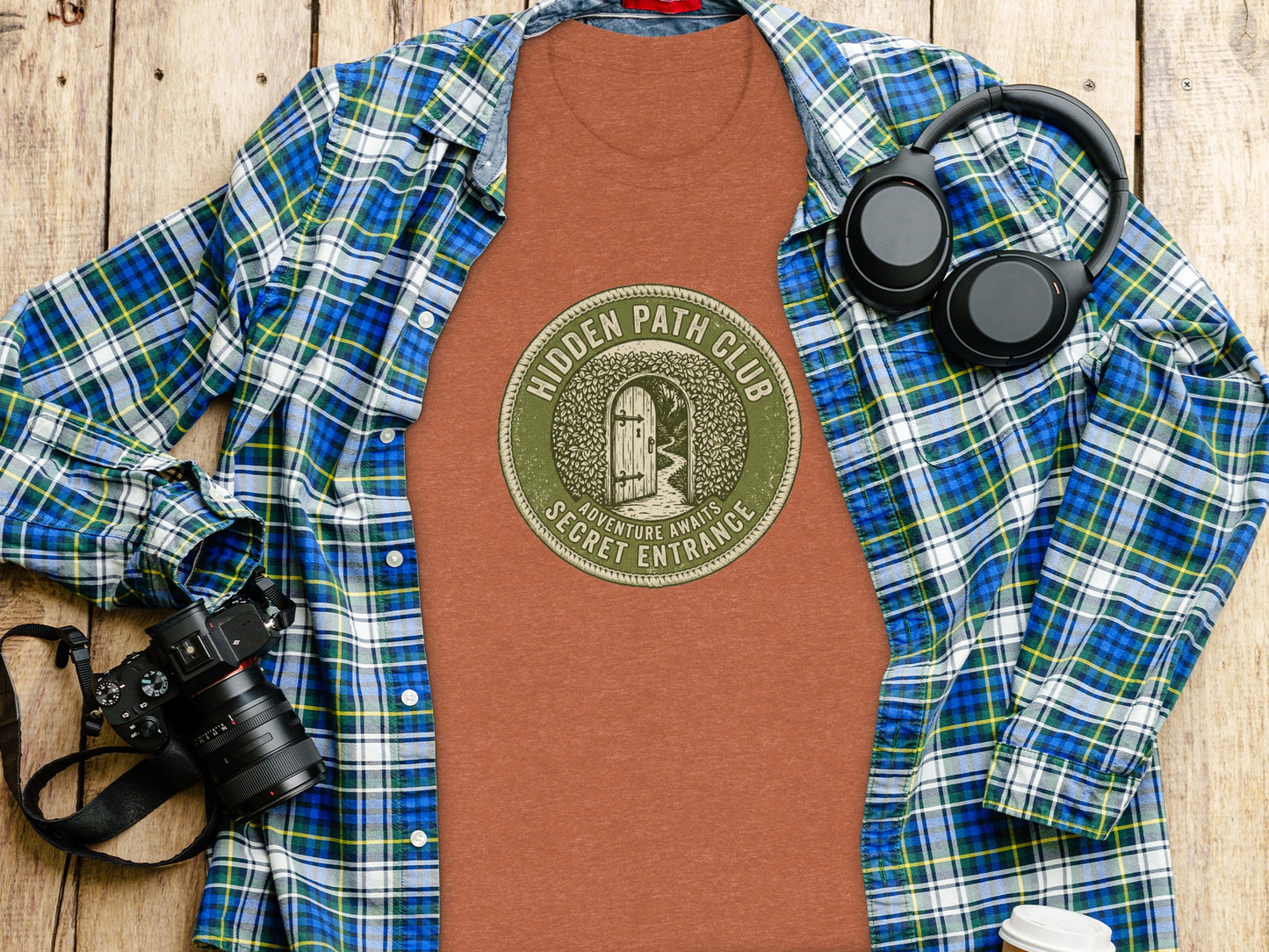 Hidden Path Club: Secret Entrance | Vintage Outdoor Apparel: Orange t-shirt with "Hidden Path Club Adventure Awaits Secret Entrance" logo, shirt laid flat.