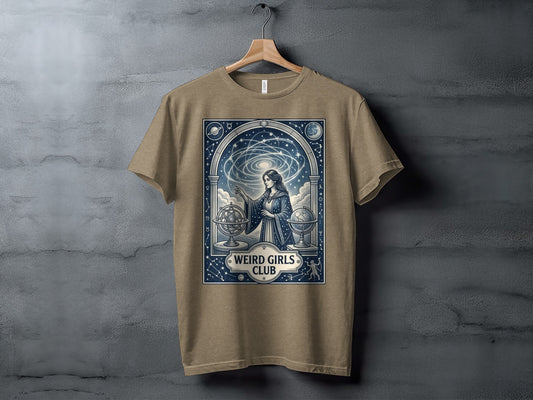 T-shirt with celestial, astrological artwork and "Weird Girls Club" text.