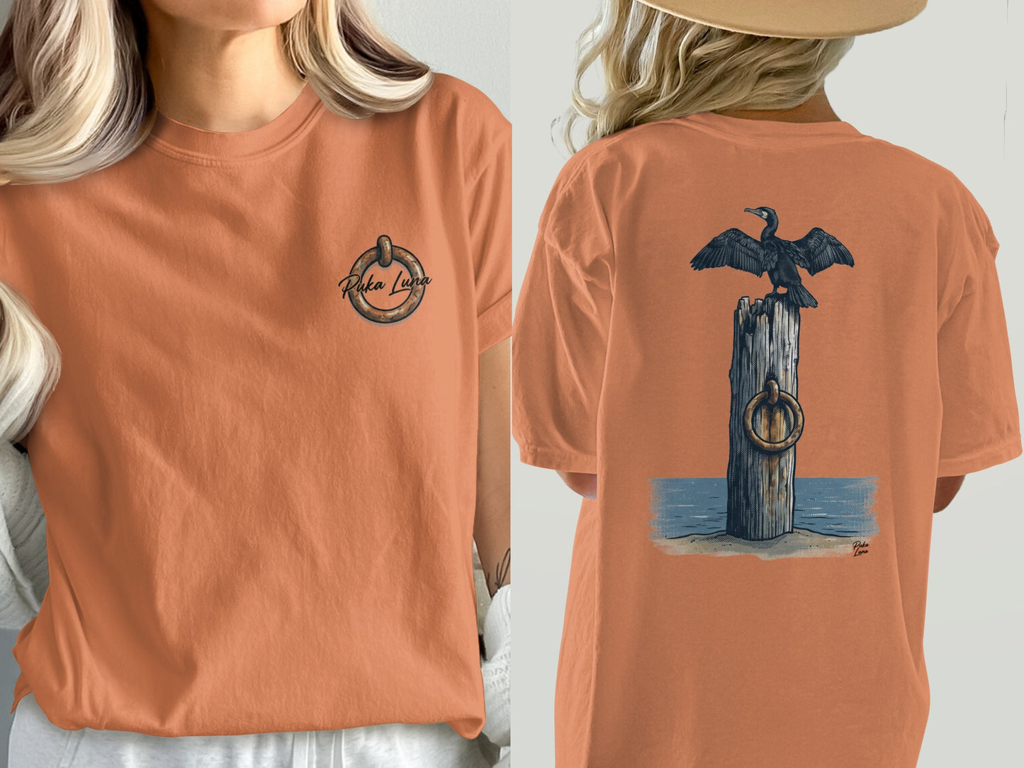 Orange t-shirt with a circular anchor logo on the front and a cormorant on a post on the back.