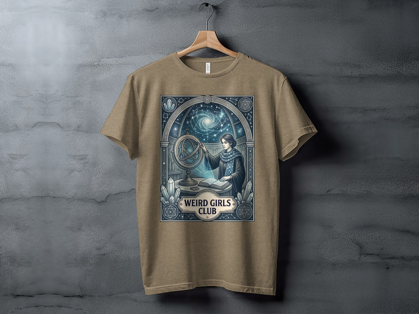 T-shirt featuring a woman with an astrolabe and crystals under a starry sky.