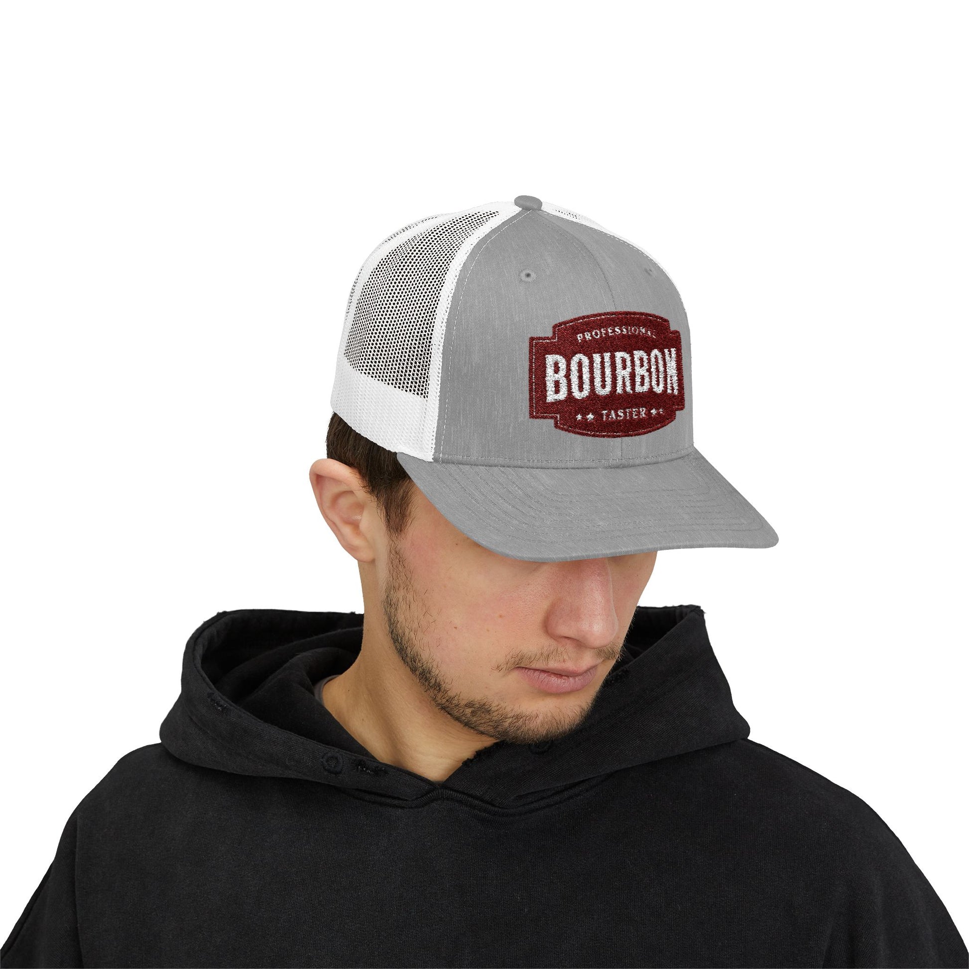 Man wearing a gray and white cap with 'Bourbon' logo on a white background