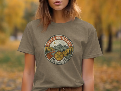 Rugged Wild & Unfiltered Explorer Wilderness Shirt: Circular emblem with mountains, compass, and "Wild & Unfiltered Outdoor Provisions" text.