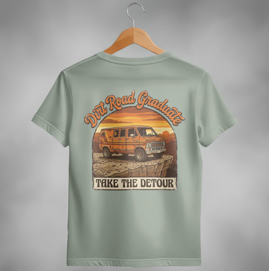 Orange van on rocky cliff at sunset with "Dirt Road Graduate Take the Detour" text.