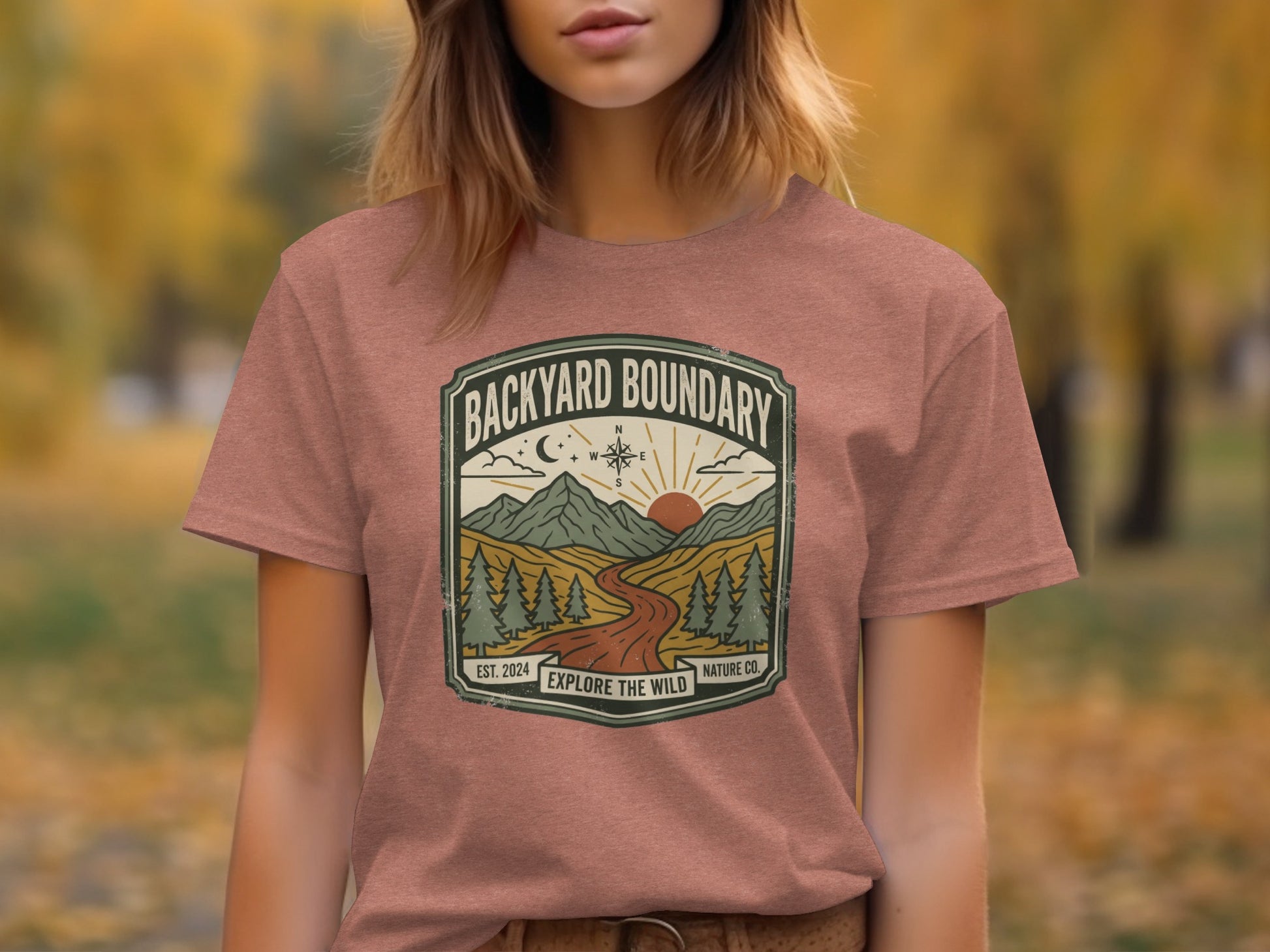 Rugged Backyard Boundary: Explore The Wild Wilderness Shirt: T-shirt with a nature scene and "Backyard Boundary Explore the Wild" text.