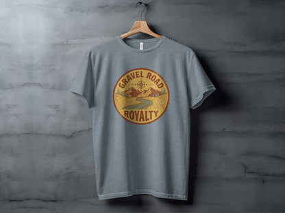 Gravel Road Royalty Adventure Tee | Vintage Outdoor Apparel: Grey t-shirt with circular "Gravel Road Royalty" logo featuring a mountain road.
