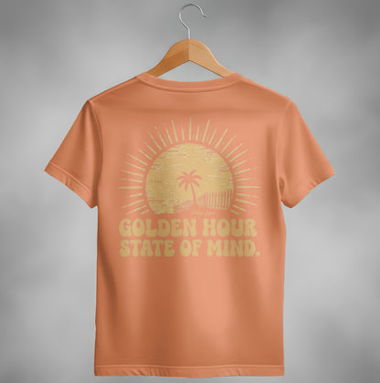 Orange t-shirt with "Golden Hour State of Mind" text and sun graphic.