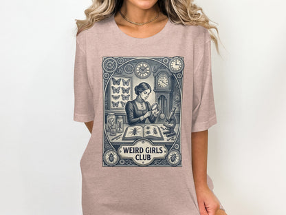 T-shirt graphic featuring a woman with butterflies and a magnifying glass.