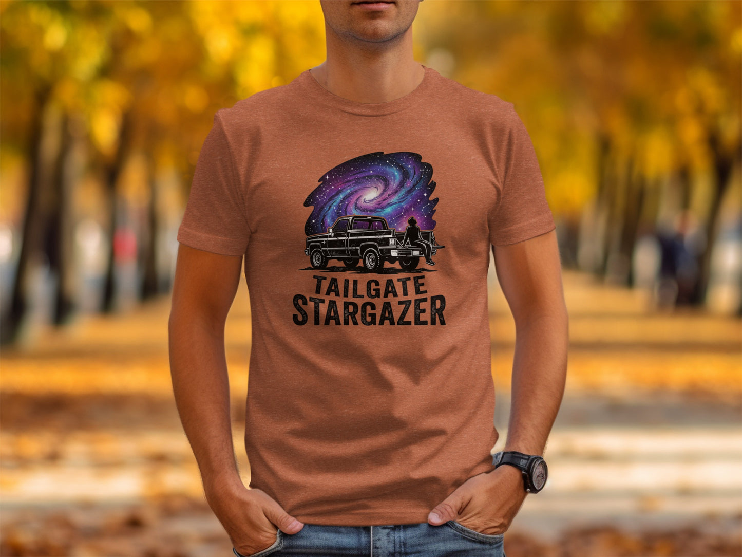 Heritage Cosmic Tailgate Stargazer Nomad Tee: T-shirt with "Tailgate Stargazer" text and galaxy design on truck tailgate.