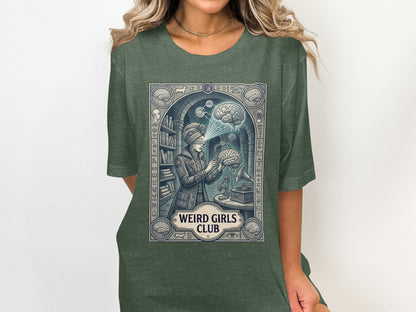 Green t-shirt with "Weird Girls Club" text and illustration of woman studying a brain.