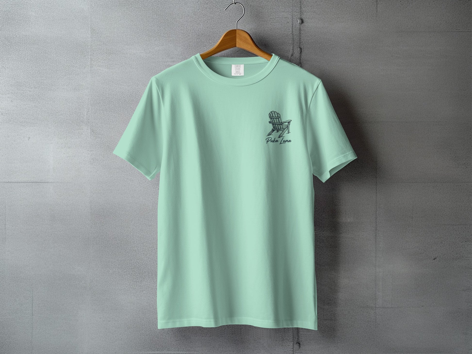 Mint green t-shirt with a beach chair graphic and "Palm Luna" text.