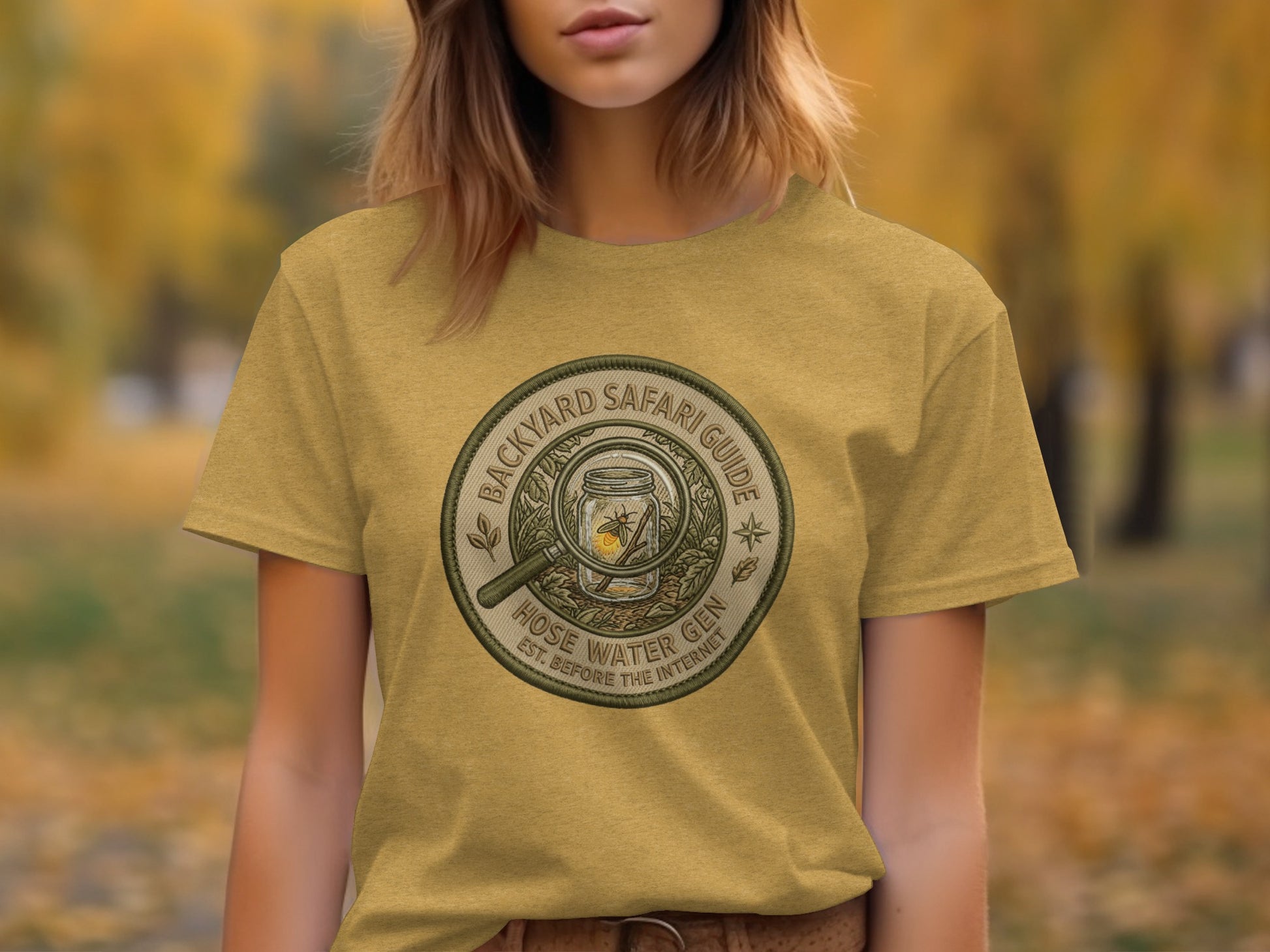 Backyard Safari Guide Explorer: Backcountry Outpost Shirt: Magnifying glass over jar with firefly on t-shirt, "Backyard Safari Guide"