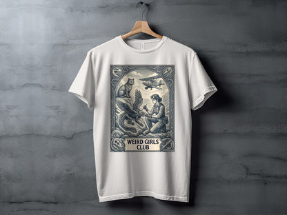 White t-shirt with "Weird Girls Club" graphic featuring a woman, eagle, and biplane.