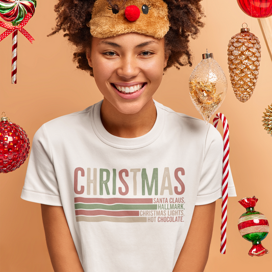 Person wearing a reindeer hat with Christmas decorations on a beige background